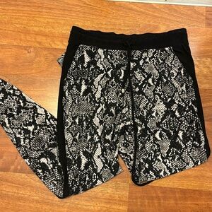 INC snake print polyester tapered pant with pockets and side stripe detail